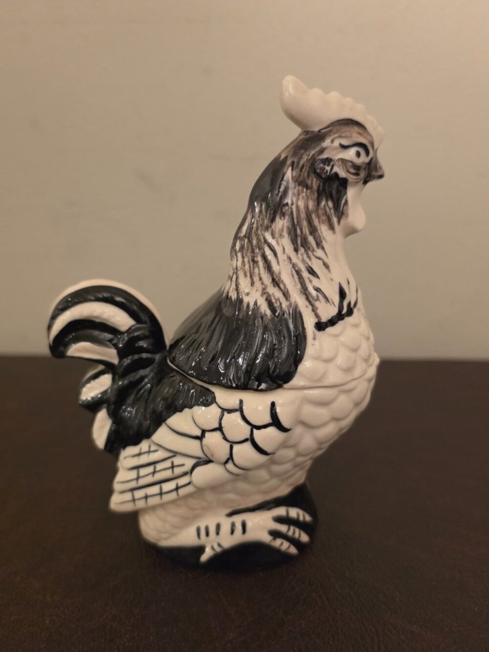 vintage ceramic rooster figurine features a charming black and white hand-painte